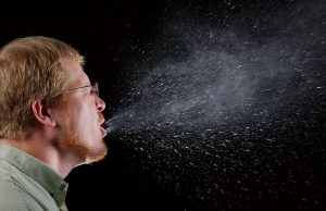 Which mask works best? We filmed people coughing and sneezing to find out