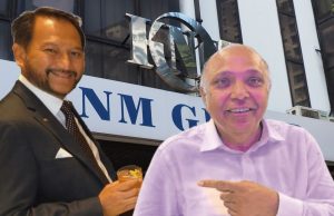 Malaysian High Court Halts KNM Group Restructuring Judge's gavel on a wooden block in a Malaysian courtroom, with legal documents and a company logo in the background.