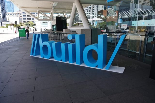 Microsoft Build conference puts AI agents at center of Copilot expansion Microsoft Build conference stage with Copilot AI agent interface displayed on large screens