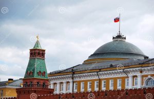Leaked Files Show Russia Weighed Nuclear Strike on China Redacted military documents stamped in Cyrillic lie beside a radiation warning symbol on a dark desk.