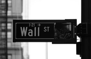 Barclays Fined £290M for Libor Manipulation Close-up of a trading screen showing the Libor rate with a red downward arrow overlay, symbolizing benchmark manipulation.