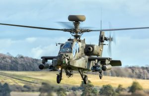 Biden Sends 18 U.S. Howitzers in $800M Ukraine Arms Surge U.S. Army 155mm howitzer positioned in a field, ready for deployment to Ukrainian forces.
