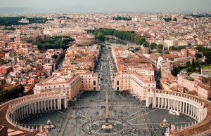 Vatican Court Jails Cardinal Becciu 5.5 Years for Embezzlement A robed cardinal stands before a Vatican courtroom as a judge reads the guilty verdict and prison sentence.