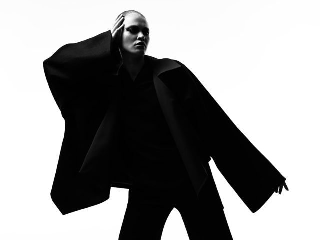 Met Gala 2025 Renamed 'Superfine: Tailoring Black Style' for Exhibition and Event Guests in formal attire ascend the Met Gala steps under bright lights, with the Metropolitan Museum of Art facade in the background.