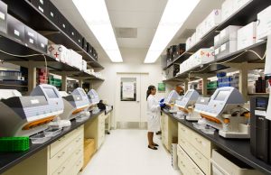 BeiGene Rebrands as BeOne Medicines in Oncology Push A modern corporate sign reading BeOne Medicines displayed in a bright lobby with glass walls and greenery.