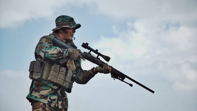 Kursk Emergency Declared as Ukrainian Incursion Destabilizes Border Region Ukrainian military vehicles advance across a field near the Russian border during the Kursk Oblast incursion.