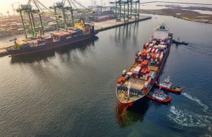 High Seas Treaty Adds Marine Protections for 169 Nations A cargo ship sails across the open ocean under a cloudy sky, representing international waters governed by the new High Seas Treaty.