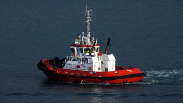 Sfax-Bound Boat Sinks Off Lampedusa, Killing 41 Migrants on August 9 A rescue boat approaches a capsized migrant vessel near Lampedusa in the Mediterranean Sea.