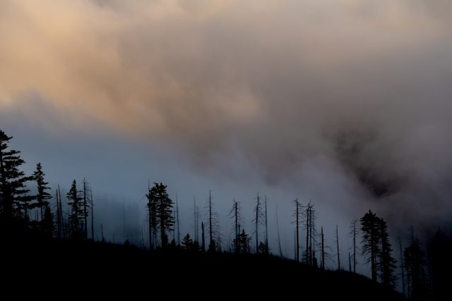 National Weather Service Issues 'Particularly Dangerous Situation' Warning for Mountain Fire A wildfire rages across a hillside in Ventura County, with flames consuming dry vegetation under a smoky sky.