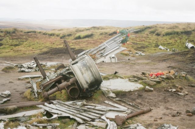Investigators Probe Fatal Cessna 207 Crash in Jalisco's Rugged Terrain A Cessna 207 single-engine plane wreckage lies scattered on a rugged hillside in El Montoso, Jalisco, with rescue crews navigating the remote terrain.