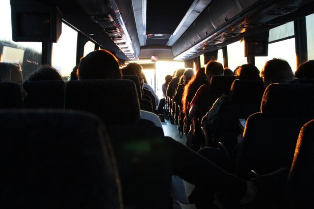 Official Account Says Driver Fell Asleep in Laos Bus Crash That Killed Five A damaged bus rests against a tree on a roadside in Laos after a fatal crash.