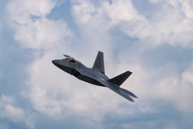 Boeing F-47 Contract Represents High-Stakes Bet on Air Dominance Boeing engineers examine a classified sixth-generation fighter jet design in a secure hangar.