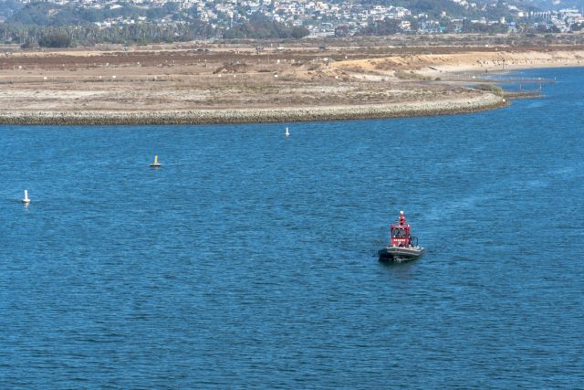 Two Children in Critical Condition After Canary Islands Migrant Boat Capsize Rescue workers airlift a child from a capsized migrant boat off the coast of El Hierro in the Canary Islands.