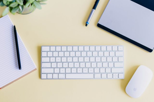 OpenAI's AgentKit Lets Developers Build Apps Directly Inside ChatGPT Developers coding on laptops with ChatGPT interface open showing embedded custom application tools