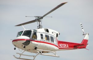 Iran Helicopter Crash Kills President Raisi, 7 Others Wreckage of a Bell 212 helicopter scattered across a mountainous terrain in Varzaqan, East Azerbaijan province, Iran.