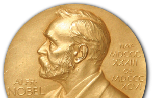 Nobel Prize in Chemistry Honors Protein Research Trio Three scientists stand at a podium receiving the Nobel Prize in Chemistry for protein research.