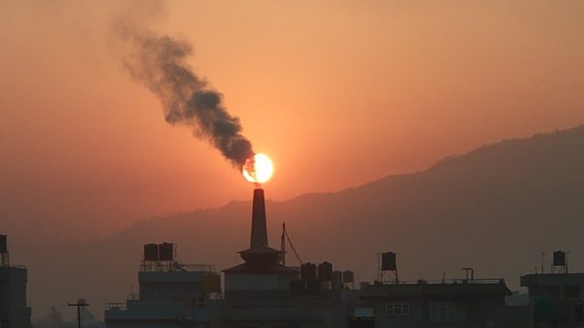 Lahore Air Pollution Reaches Record High, Schools Closed for a Week Smog blankets Lahore cityscape as children walk near closed school gates under hazy skies.