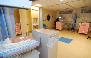Jhansi NICU Fire Kills 10 Newborns, Injures 16 Firefighters and medics evacuate incubators from a smoke-filled neonatal ICU corridor after flames erupt in the Jhansi hospital ward.
