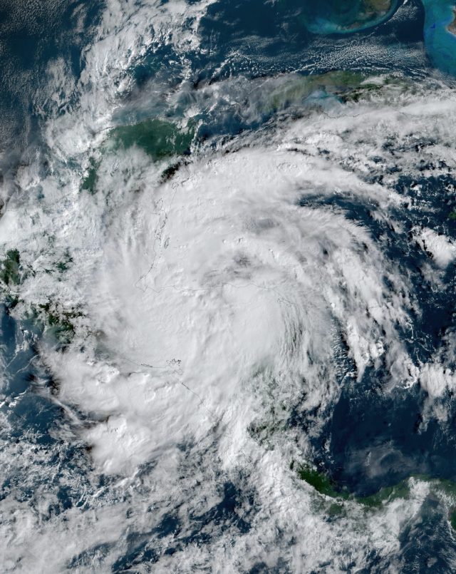 Tropical Storm Sara Makes Landfall in Belize After Affecting Honduras Satellite image of Tropical Storm Sara approaching the coast of Belize with heavy cloud cover and rain bands.