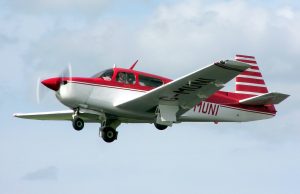 Three Killed in Tennessee Mooney M20 Plane Crash Wreckage of a small Mooney M20 plane scattered among trees in a forested area near Reliance, Tennessee.