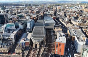 Blaze Destroys Historic Building Near Glasgow Central Firefighters battle a large blaze engulfing a historic building next to Glasgow Central railway station, with smoke billowing over the city.