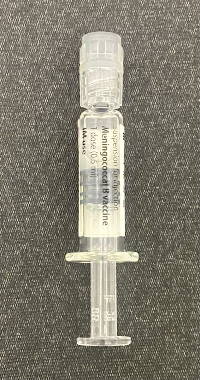 University of Kent begins meningococcal vaccine rollout after outbreak kills two A healthcare worker administers a meningococcal vaccine injection to a university student at a campus clinic.