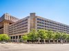 FBI Releases 1947-68 UFO Case File 62-HQ-83894 With Fewer Redactions A researcher scrolls through newly released FBI UFO documents on a laptop screen showing declassified pages from 1947-1968.
