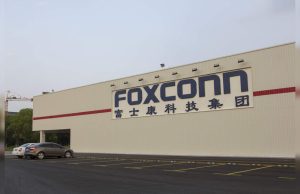 Foxconn Negotiates Stake in Chipmaker DNeX Foxconn chairman Young Liu speaks at a press conference as the company negotiates a chipmaking stake in Malaysia.