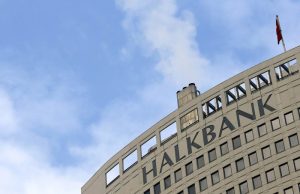 Halkbank Scandals Trigger Executive Arrests Exterior view of Halkbank headquarters in Ankara with Turkish flags flying above the entrance
