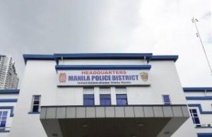 Manila Trader Chua Arrested for 213% Thermometer Mark-Up Plain-clothes CIDG officers count seized thermometers stacked in two plastic boxes on a hotel bed after a Manila sting operation.