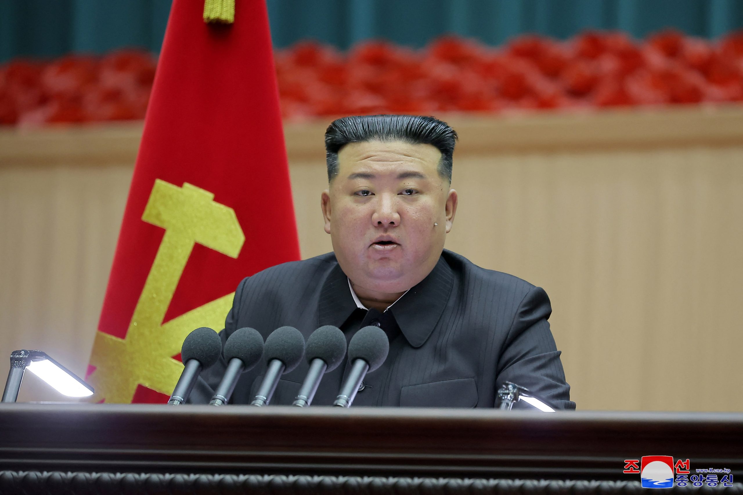 US Demands Tougher UN Sanctions After N. Korea ICBM Test A North Korean Hwasong-17 intercontinental ballistic missile launches from a road-mobile launcher, leaving a trail of smoke against a clear sky.