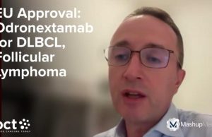 EU Approves Odronextamab for Two Lymphomas A scientist in a lab coat examines a vial of Odronextamab, a cancer therapy, under bright laboratory lights.