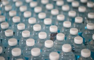 Spritzer Opens RM60 Million Automated Warehouse Workers operate machinery inside Spritzer's new RM60 million automated warehouse in Taiping, Malaysia.