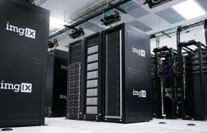 UK Bets on Limited Huawei 5G Role Despite US Warnings Huawei 5G antenna equipment installed on a UK telecommunications mast, with a British flag visible in the background.
