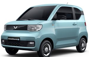 Wuling Mini EV Surpasses 1.1 Million Global Sales Compact Wuling Hongguang Mini EV parked on a city street, showcasing its small electric design for urban commuting.