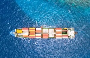 Malaysia Posts RM112.3 Billion February Exports, Up 9.8% Cargo containers at a Malaysian port with factory skyline in the background during loading operations