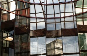 HSBC Vatican Bank Accounts Probe Resurfaces HSBC bank building exterior with Vatican City skyline in background