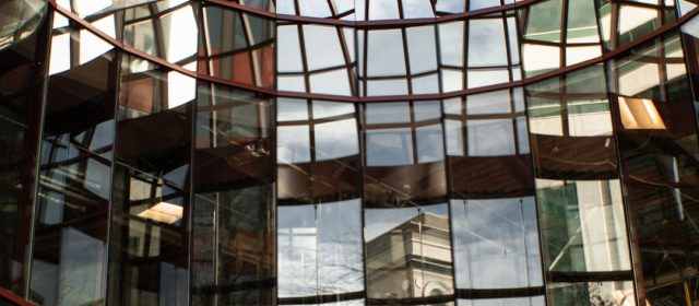 IOR's 2012 reform presentation follows decades of Vatican Bank scandals HSBC bank building exterior with Vatican City skyline in background