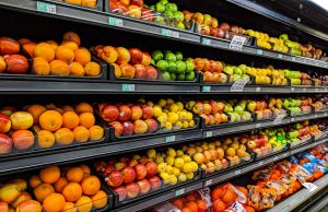 UN Food Price Index Surges 4.8% to 2011 Peak Rows of wheat stalks under a cloudy sky, symbolizing rising cereal costs worldwide.