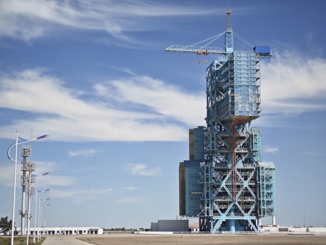 SpaceX’s launch tower catches Starship booster in historic fifth test flight SpaceX launch tower mechanical arms gripping a descending rocket booster at Starbase in Texas