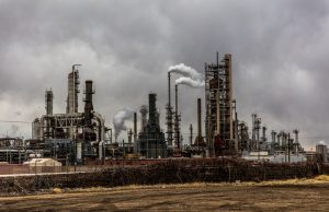 Power Outage Shuts CALNEV Pipeline, Disrupts Vegas Fuel A desert pipeline stretches across arid land under a clear sky, with a pump station in the distance.